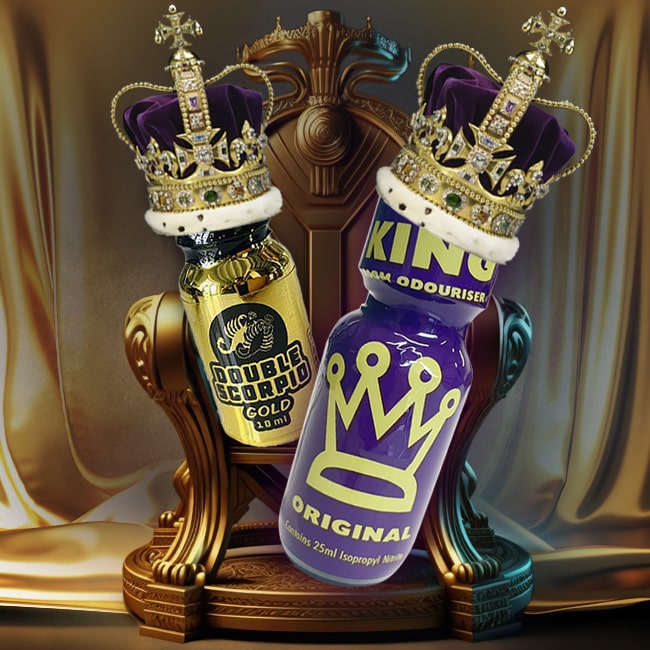 Two ornate bottles of The Midas Touch body spray designed to resemble royalty, complete with crowns, sit majestically atop golden thrones against a luxurious backdrop, exuding an air of opulence.